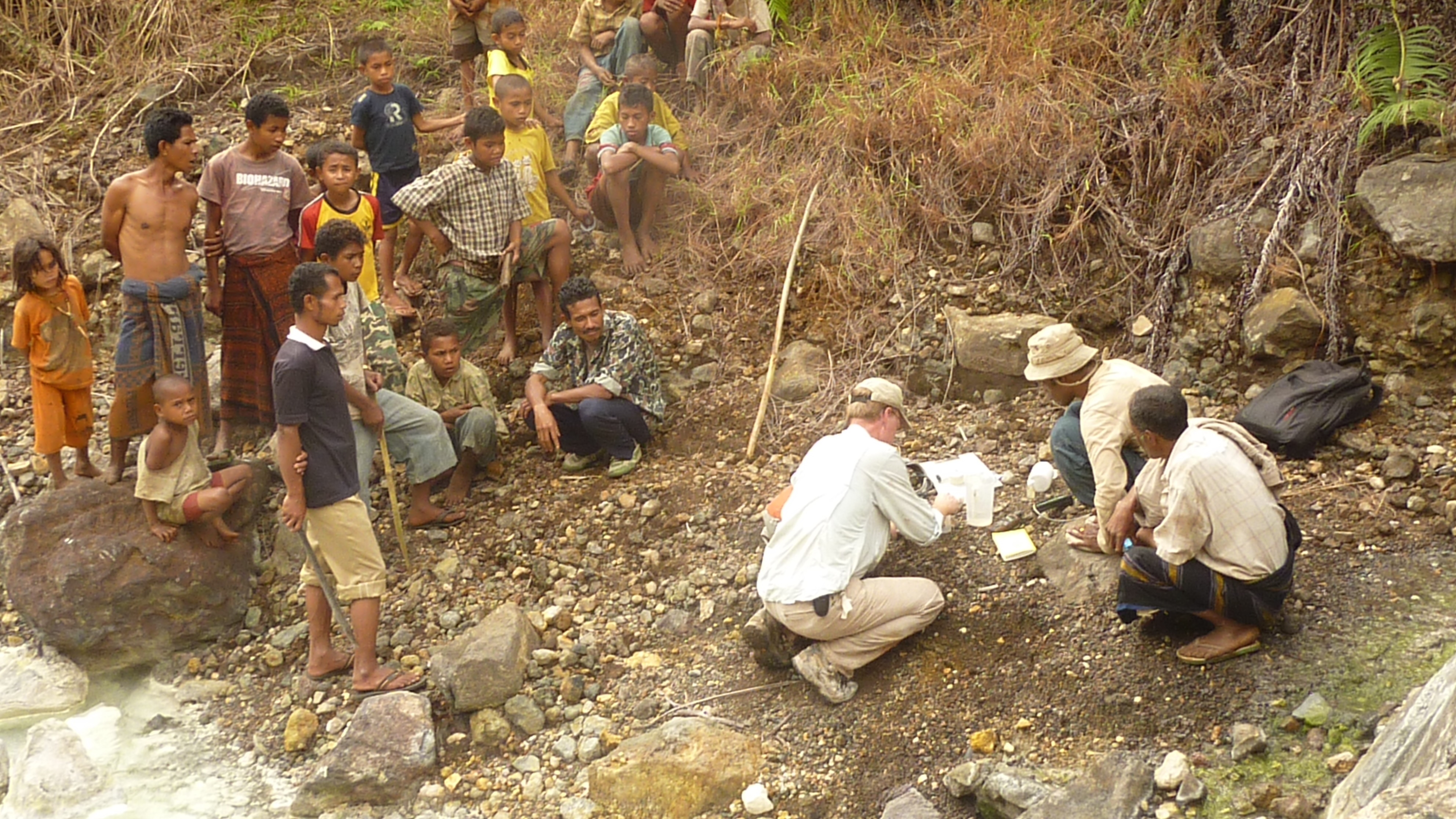 Geologist sampling at Toba hot spring